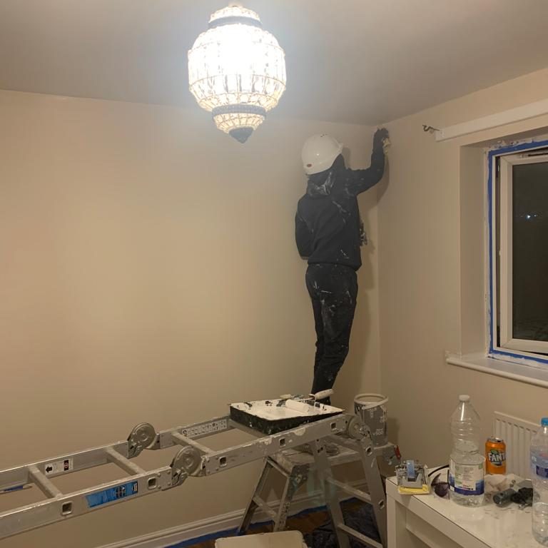 Painter completing a job